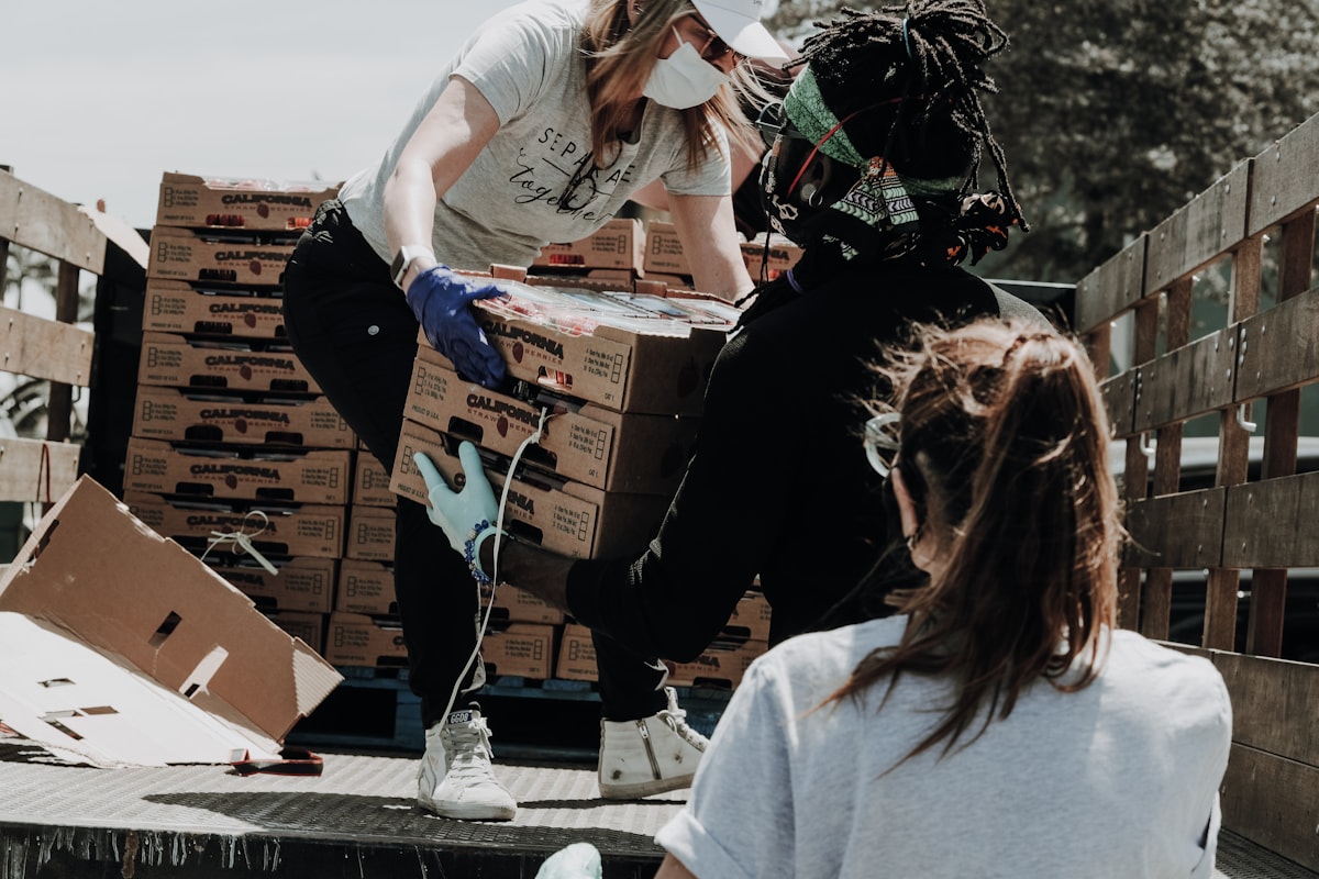 Community volunteers organizing support materials together
